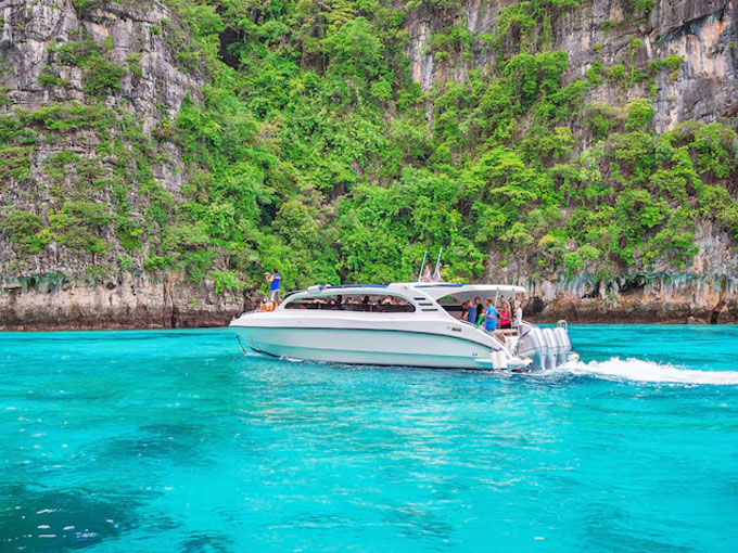 Thailand beach and sailing boat on a Phuket sailing adventure