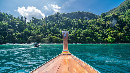 Longtail boats around Koh Phi Phi in Thailand
